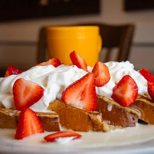strawberries and whipped cream on toast