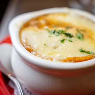a bowl of soup on a plate