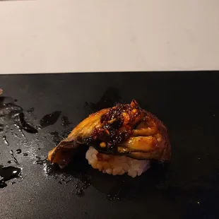 Unagi (fresh water eel) with "super secret" chili crisps. We were able to sniff out who made it right away. ;)