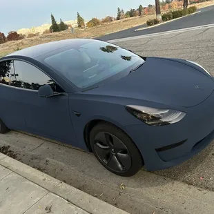 Wrapped car, tinting windows and lights.