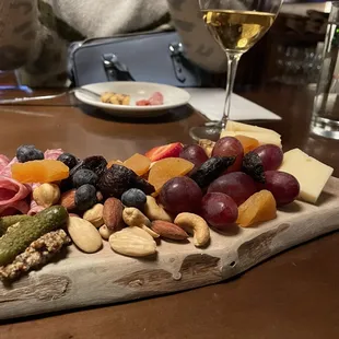a platter of fruit and nuts