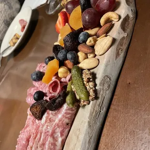 a platter of fruit and cheese