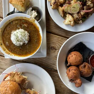 Gumbo with cornbread (upper left) Roasted cauliflower (upper right) Catfish Sliders (lower left) Hush Puppies (lower right)