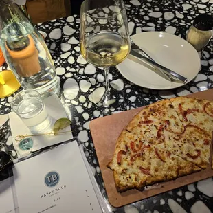 White  lightning half pizza . White wine