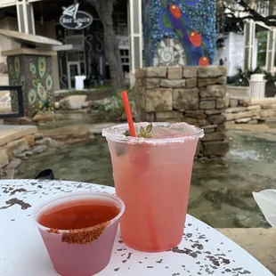 Prickly pear margarita on the rocks with sugar rim &amp; a Mexican Candy shot