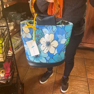 a woman holding a bag