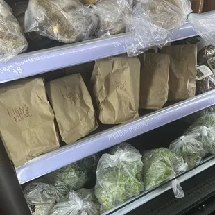 Assortments of bagged veggies and mushrooms