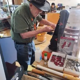 Sharpening a knife on a grinding stone