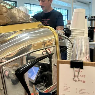 Another employee had to come tap his shoulder to stop talking to his friends while I was waiting at the counter.