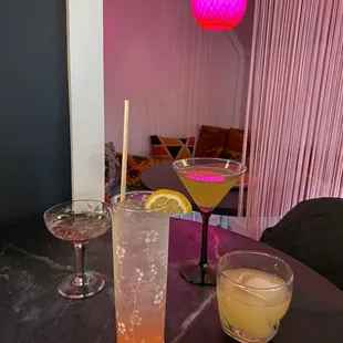 two cocktails on a table
