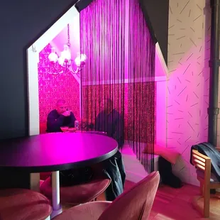 a man sitting at a round table