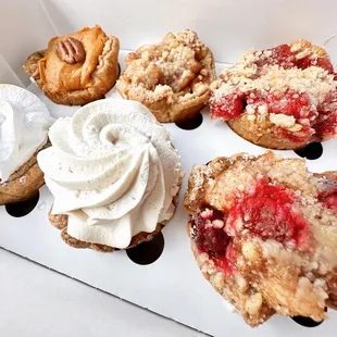 a variety of pastries in a box