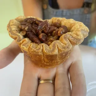 Their Pecan Pie: just a bunch of coated and gooey nuts without any filling.