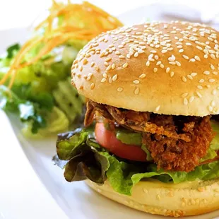 Soft Shell Crab BLT: fried panko crusted soft shell crab served on toasted sesame bun, avocado, bacon, lettuce, tomato, maple dijon ($15).