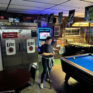 a man playing a game of pool