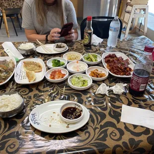 Jap Chae on the left, the side items, and pork bulgogi on the far right.
