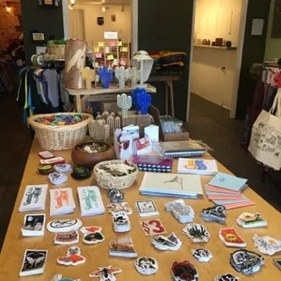 Lots of printed goods and little items that make sweet presents: stickers, notebooks, earrings...