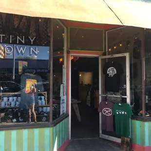 Tiny Town is located on Fourth Ave two doors south of the food co-op.