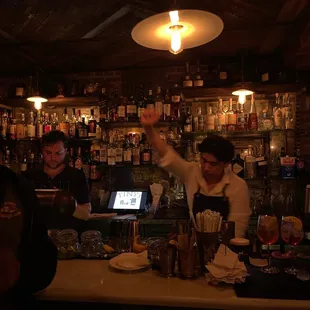 a bartender at the bar