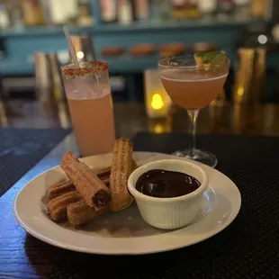 Yummy churros and chocolate sauce