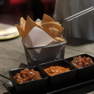 Totopos Y Salsas (extra tortilla chips will run you $3)