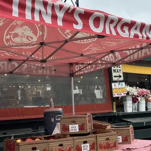 a display of apples at a farmers market