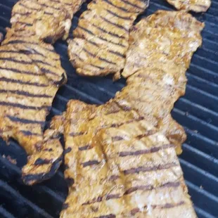 Adobada pork on the grill.