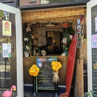 Festive pickup window on South Street side for online orders or to-go beverages