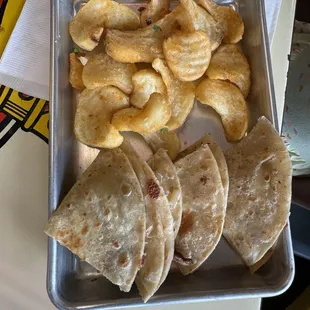 Kids chicken quesadilla with twisted fries and mango agua Fresca