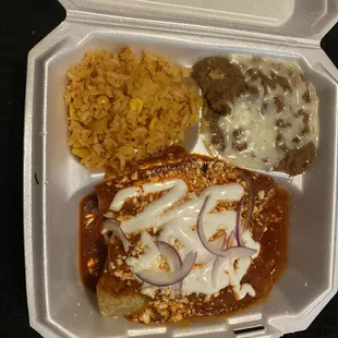 a meal in a styrofoam container