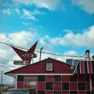 a car parked in front of a diner