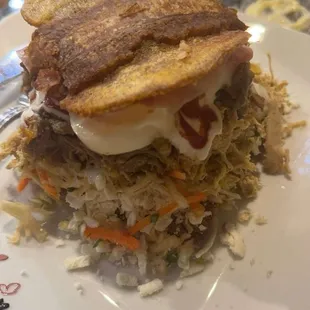 Patacon with chicken and beef.