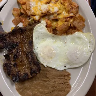 Steak and chiliquilies breakfast