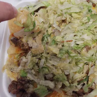 The chips were soggy, the lettuce slimy from the microwave, and the meat was tough.