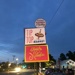 a sign for tip top market