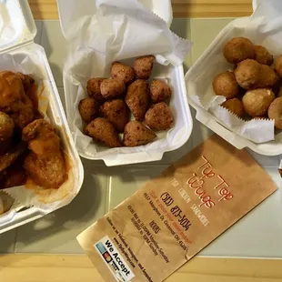 10 piece Buffalo Whole Wings, Hush Puppies, Fried Mushrooms and Fries.