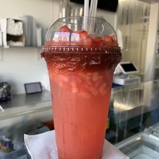a drink in a plastic cup