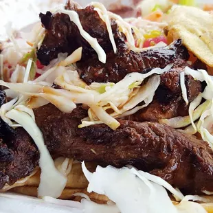 Carne Asada con Tajadas.