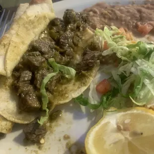 Tacos Al Carbon Taco Plate (it was just the beef stew in a tortilla )