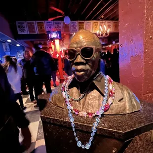 a bust of a man wearing sunglasses