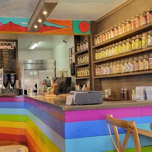 a brightly colored counter in a cafe