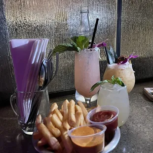 Floral Reef $16 - Ginger guava tequila , Lightkeepers Daughter $15- pineapple coconut rum, The Green Flash $14- Basil Fuji apple Vodka