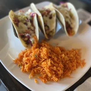 Walnut meat tacos with saffron rice