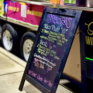 a chalk board with a menu on it