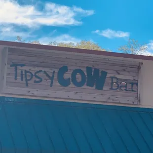 a sign on the side of a building