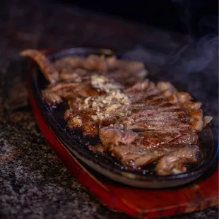 Sizzling steak.