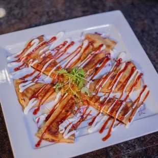 kalua pig quesadilla with smoked tako salsa.
