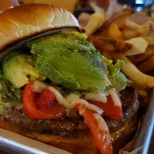 Impossible burger ($14), vegan by default. Decent, but greasy and oily because of the cheese &amp; roasted peppers.