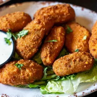 a plate of fried chicken nuggies