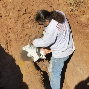 Zeke is making cut on 8inch water main,will make proper repair!! Count on Zeke at Tiptons Plumbing and Sewer to get the job done